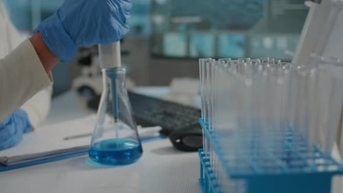 Scientific Experiment: Pipette Transfer in Modern Laboratory