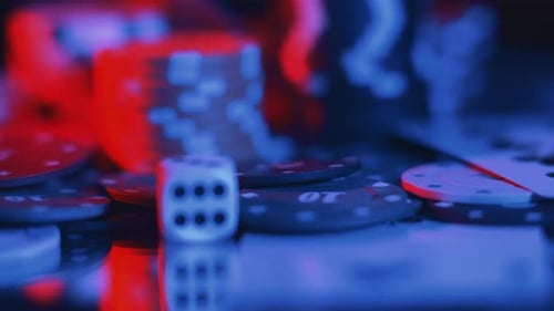 Casino Chips and Playing Cards in Motion