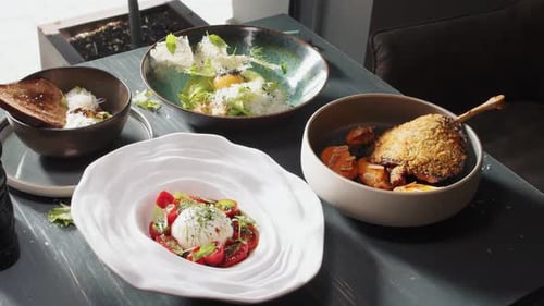 Set Table with Gourmet High Kitchen Dinner Plates and Dishes at the Restaurant