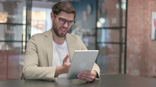 Man Reacts Badly to News on Tablet