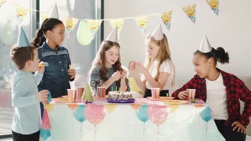 Children Celebrating at Colorful Birthday Party Indoors