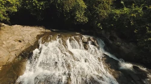 Aerial View of a Tropical Waterfall in Nature