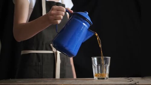 Coffee From Pot in Coffee Shop Cafe