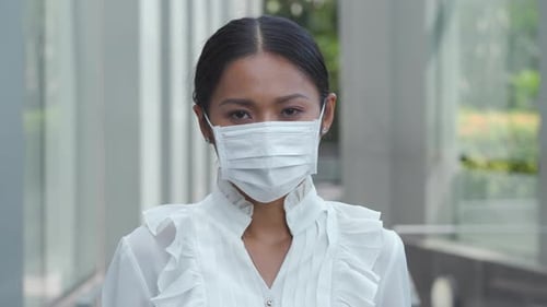 Woman Wearing Face Mask Close Up in City