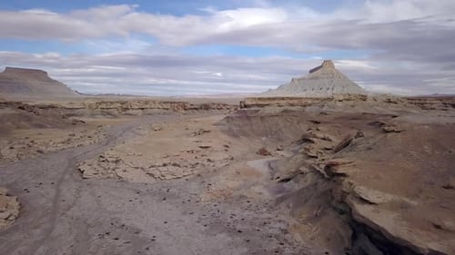 Flying low through the Utah desert towards Factory Butte