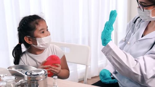 School Girl Visits Skillful Doctor at Hospital for Vaccination