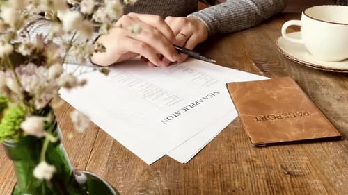Visa Application with Passport on Rustic Table