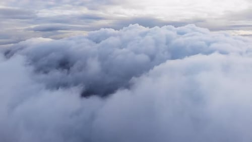 Amazing Aerial Shot Drone Flying Over Fluffy Blue and White Clouds