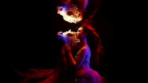 Woman and Dragon are Swimming in Mysterious Dark Deepness in Sea Fantasy and Fairytale