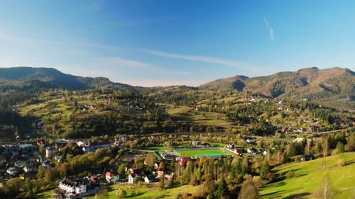 Aerial View on Town Surrounded Mountains