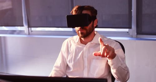 Businessman using virtual reality headset