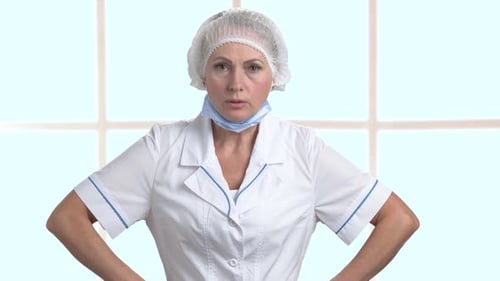 Angry Doctor on Clinic Window Background.