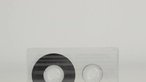 Close-up of retro audio compact cassette 4K 2160p 30fps UltraHD tilting footage - Analogue music m