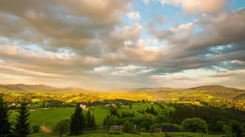 Time Lapse of Blue Sky with Clouds Over Mountain