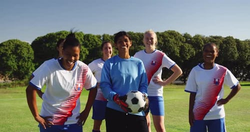 Female soccer team standing on soccer field. 4k