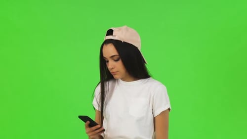 Beautiful Woman Taking Selfies on Chromakey Background