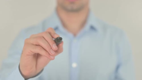 Man Writing Ready with Black Marker