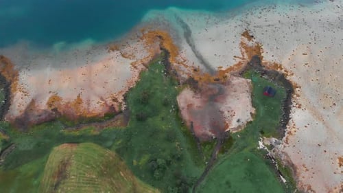 Picturesque Coastal Landscape with Red House Aerial View