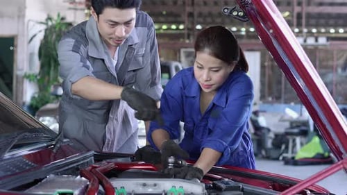 Technician checking car