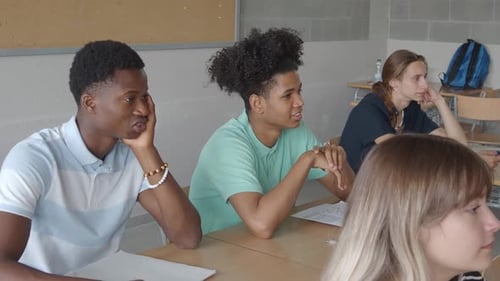Students in Classroom Listening Attentively to Teacher