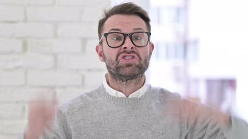 Man Yelling and Making Faces