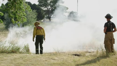 Firefighters Battling Blaze in Rural Setting
