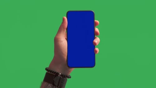 Male Tattooed Hand Reveals Smartphone Chroma Key