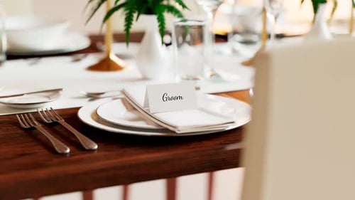Wedding place card on the plate. Animation of elegant tableware at a restaurant.