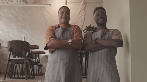 Waiters Posing in Restaurant