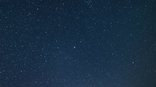 Twinkling Stars in a Dark Blue Night Sky