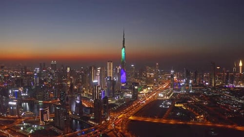 Aerial view of Burj Khalifa in Dubai Downtown skyline and highway, United Arab Emirates or UAE