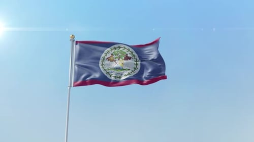 Belize Flag Waving in Bright Blue Sky