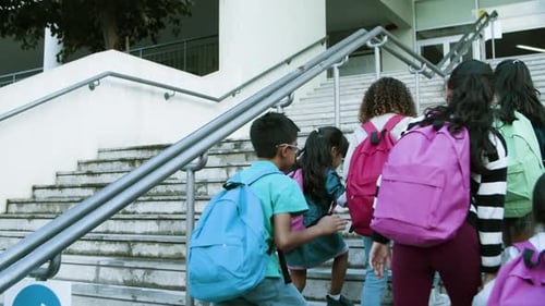 Children Walk to School with Backpacks