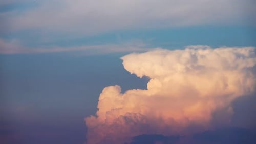 Towering Cumulonimbus Clouds at Sunrise or Sunset