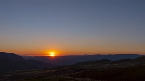 Sunset Time Lapse Over Mountainous Rural Landscape