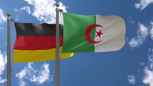 National Flags of Germany and Algeria Waving in Wind