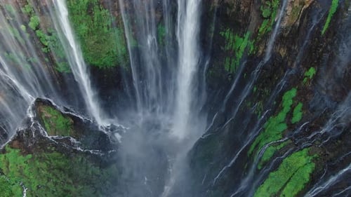 Aerial view of epic powerful waterfall