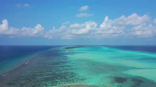 Paradise tropical gateway of Maldivian atolls with shallow illuminated turquoise lagoon full of cora