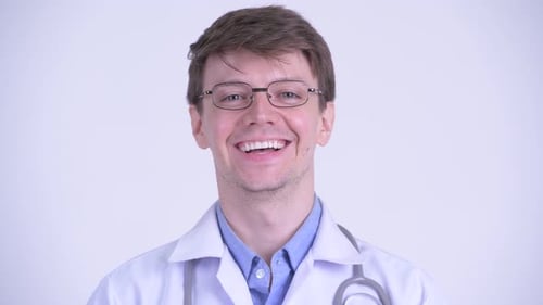 Smiling Doctor in White Coat Close Up