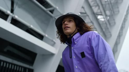 Focused Man Riding on Skateboard Outdoor