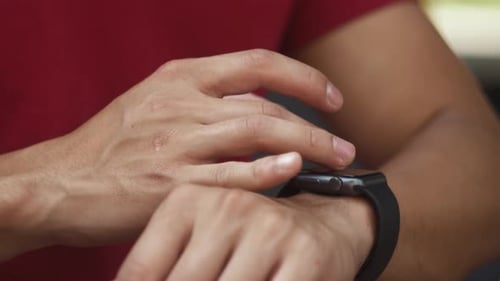 Close Up of Athlete Practicing with Smartwatch on His Wrist