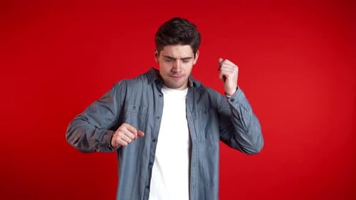 Hipster Man Moving To the Music on Red Background. Dancing Positive Comic Guy