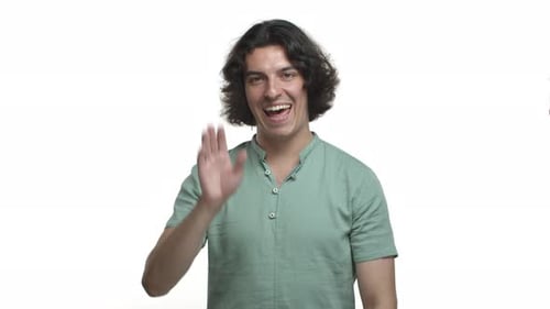 Handsome Modest Guy in Green Shirt Waving Away and Smiling Humble Grateful for Compliment Standing