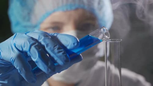 A Female Scientist Works in a Modern Laboratory