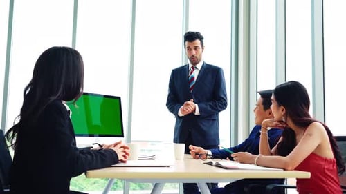 Business People in the Conference Room with Green Screen