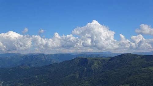 Timelapse in mountains of Dombay national park in Russia