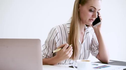 Blonde Business Woman Working at Modern Office