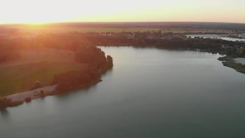 Majestic View of Lake and Fields During Golden Hour