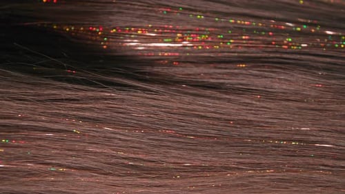 Fashionable Hair Extensions Closeup of Hairstyle with Trendy Stylish Shiny Thread in Hair Vertical