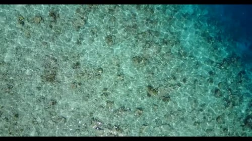 Aerial texture of marine island beach adventure by blue water and white sand background of a dayout